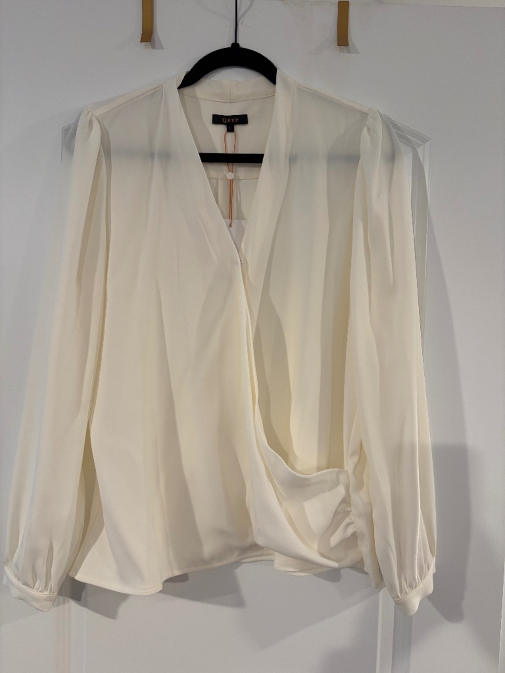 Drape cream blouse from Quince L